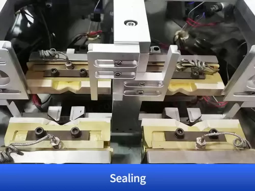 spout inserting sealing machine